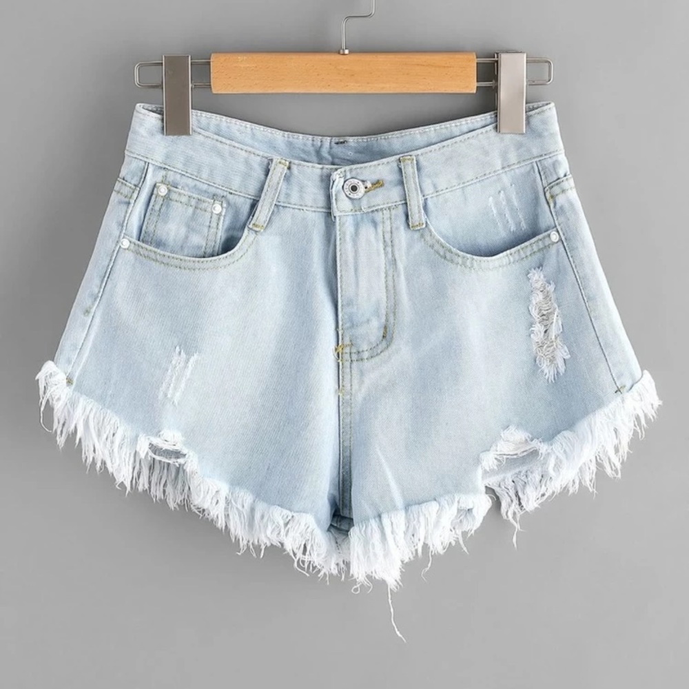 SHEIN Plus Raw Hem Ripped Denim Shorts Light Blue